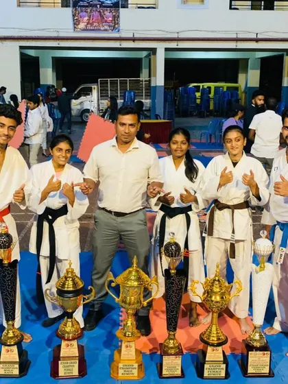 Hard work pays off, and I couldn't be prouder of my team. This picture was taken after the 13th state-level inter-dojo karate championship, where my students brought home a line of trophies, showcasing their skill in both Kata and Kumite.