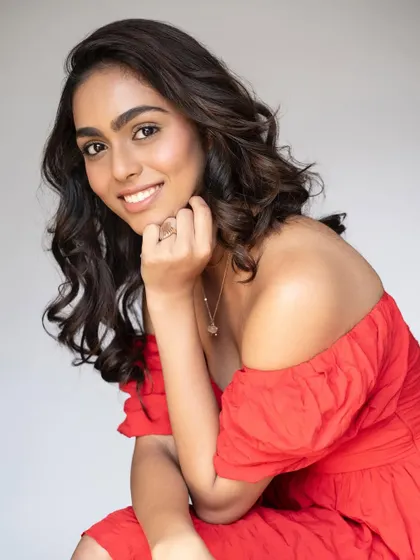 A cute and vibrant look with a bright red dress. I created voluminous curls and a dewy makeup look to match the playful vibe.