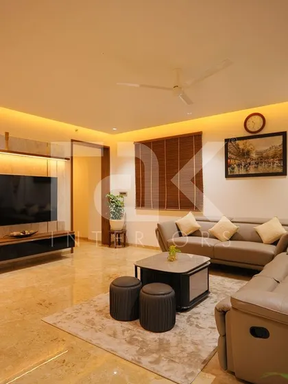 A comfortable family living area with a recliner sofa, perfect for movie nights and relaxation.