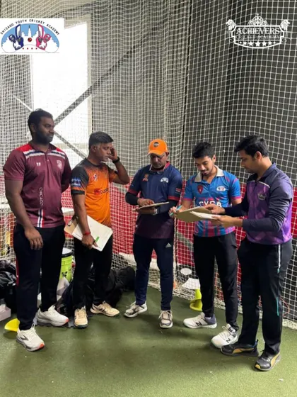 The coaching panel, a mix of Achievers and CYCA staff, discussing player performances during the trials. This collaborative evaluation ensures a fair and thorough selection process.