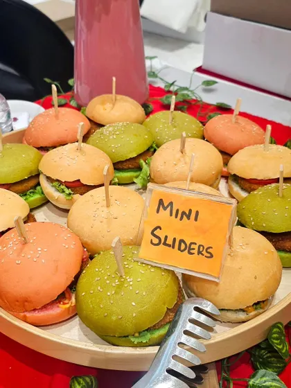 Grab a bite! These colorful mini veg sliders are a feast for the eyes and the stomach. They are a fantastic addition to any party or workshop grazing table.
