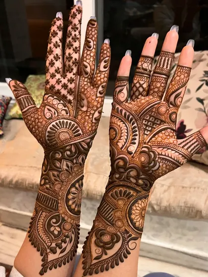Here is a complete bridal design showcasing a mix of geometric and floral patterns. I focus on creating a balanced composition that is both traditional and feels unique to you.