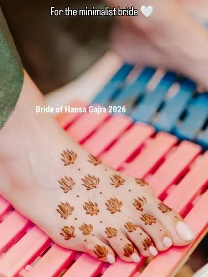 Minimal mehendi for the feet. This simple yet beautiful design features small lotus motifs scattered across the foot, creating a delicate and modern look.