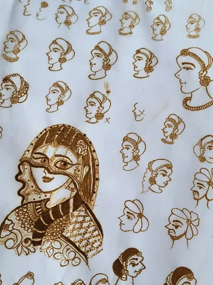 This is my practice sheet for portrait work. Before creating a final design, I sketch out different faces, expressions, and angles. This practice is essential for achieving realistic and beautiful figures in bridal mehndi.
