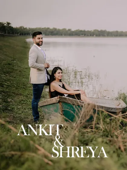 A classic pre-wedding pose by a boat, capturing a timeless romantic vibe.