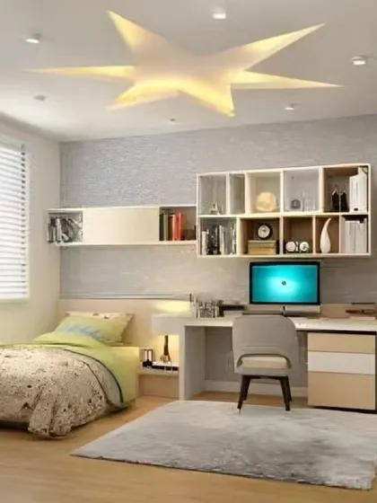 A bright kids' study room with a star-shaped ceiling light and plenty of open shelving for books and toys.