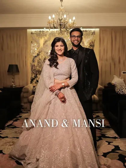 A formal portrait of the newly engaged couple. Their elegant attire and the luxurious decor create a sophisticated and timeless image of their special night.