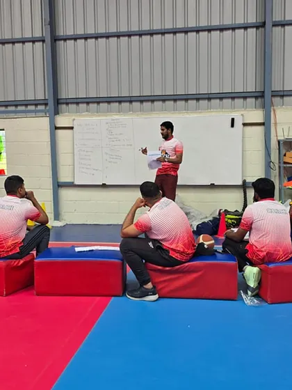 A classroom session during our Coaches Clinic. We cover essential technical and tactical aspects of the game to elevate our coaching skills.