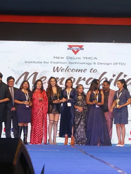 All the award winners and esteemed guests gather on stage for a group photo at the conclusion of Memorabilia.