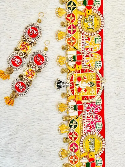 This complete door decor set features a Ganesha bandhanwar with matching Shubh, Labh, Riddhi, and Siddhi hangings, perfect for inviting blessings and prosperity.