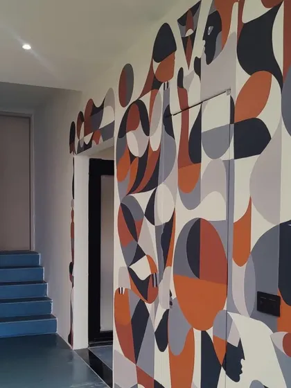 Another view of the mural flowing around the corridor.