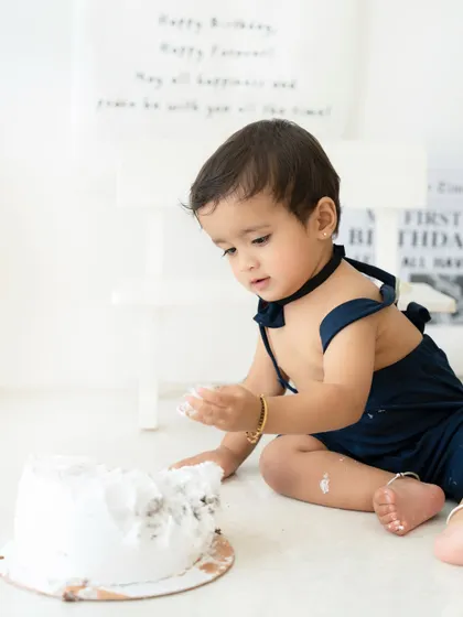 Digging in! This little one is fully enjoying his cake smash experience. My goal is to create a fun and relaxed environment for these sessions.