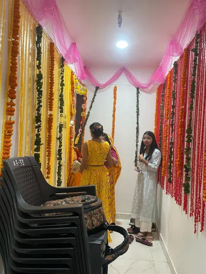 Simple and beautiful flower decoration for a Griha Pravesh ceremony. I use fresh marigold garlands and colorful chunni to create a traditional and auspicious welcome for your new home.