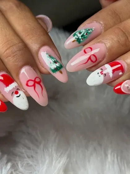 Getting into the festive spirit with this Christmas-themed nail art. This set includes hand-painted Santa hats, tiny Christmas trees, and delicate red bows, making it the perfect accessory for the holiday season.