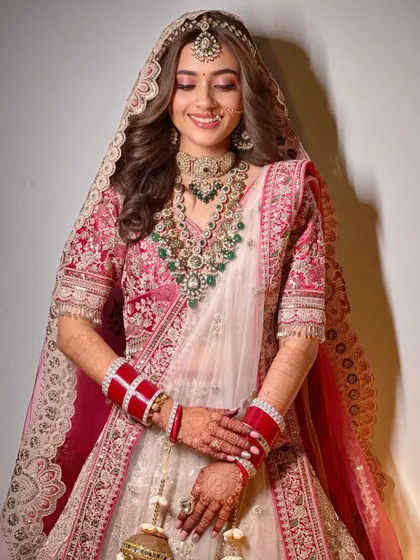 A beautiful portrait of the bride. The minimal makeup and soft waves create a look that is both modern and timeless.