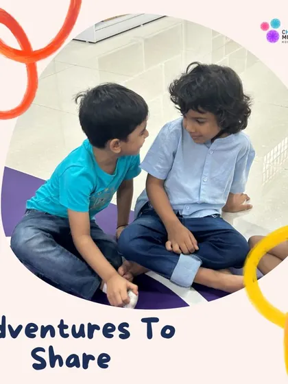 Adventures to share. Two boys are deep in conversation, a moment of connection and friendship that is a core part of the school experience.