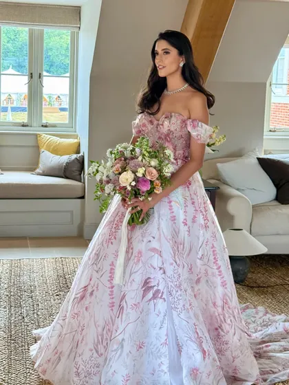 A full view of this fairytale bride. Her soft, natural makeup was designed to complement the romantic feel of her Hermione de Paula gown and the beautiful UK setting.