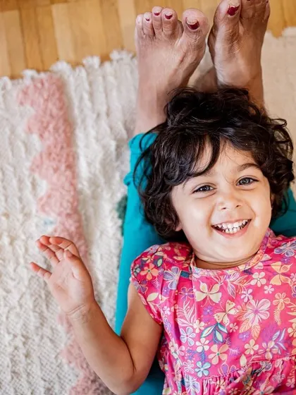 The pure joy of playing in a circus tent. I love capturing the uninhibited laughter and imagination of toddlers during our sessions.