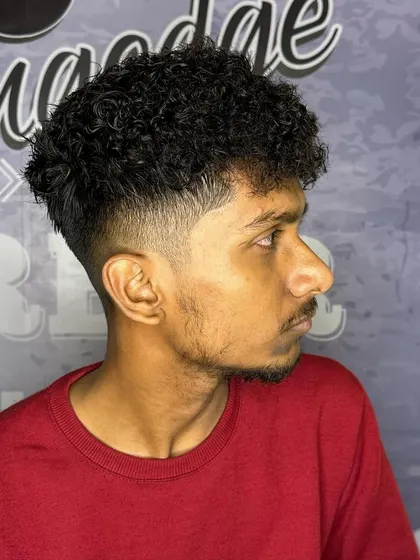 Another view of this curly haircut, showing the clean lines and great texture.