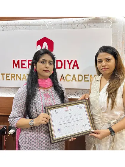 Another student successfully completes her course and is ready for a career in beauty.