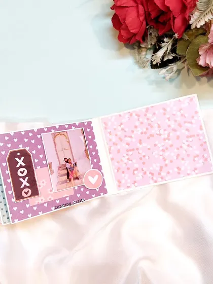 A purple-themed page from the anniversary mini scrapbook.