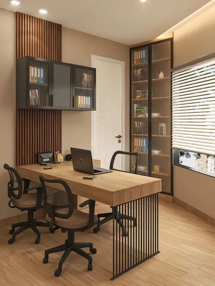 For this home office in Lajpat Nagar, I designed a shared workspace with a clean, minimalist aesthetic. The wooden desk is supported by a sleek metal frame, and fluted glass cabinets provide storage that is both functional and decorative.