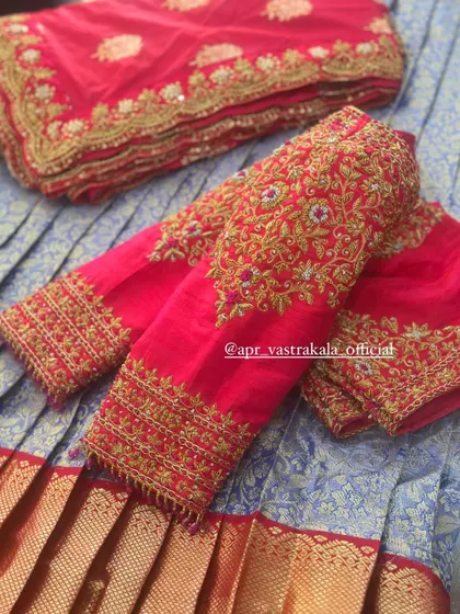 A pink blouse with heavy gold zardosi work.