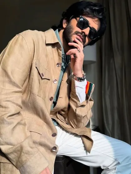 Another shot of Harshvarrdhan Kapoor, showcasing a relaxed, sun-kissed look. We create versatile styles for our clients' different needs.