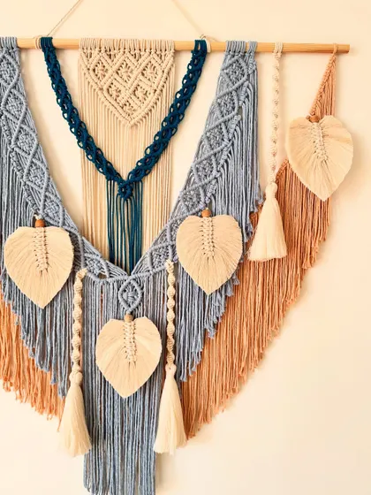 Another angle of the custom blue and tan wall hanging, ready to be sent to its forever home.