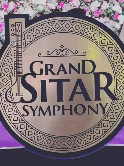 Another look at our Grand Sitar Symphony logo, which we proudly display at our large-scale wedding and corporate event performances.