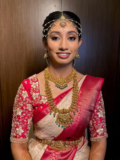 A happy, smiling portrait of my bride Chaitra. Her makeup enhances her natural beauty, which is always my ultimate goal.