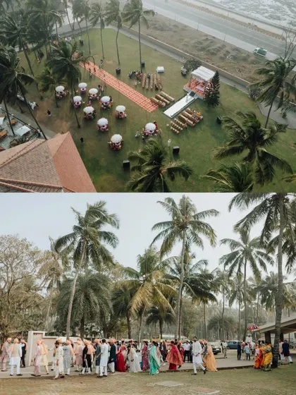 An aerial view of the stunning beachside wedding setup and the arriving Baraat, capturing the grand scale of the event.