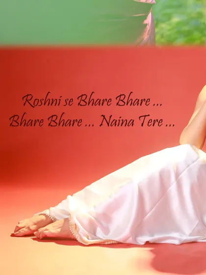 An artistic, abstract shot focusing on the lower half of the draped saree and the model's feet. This kind of detail shot adds variety to a portfolio.