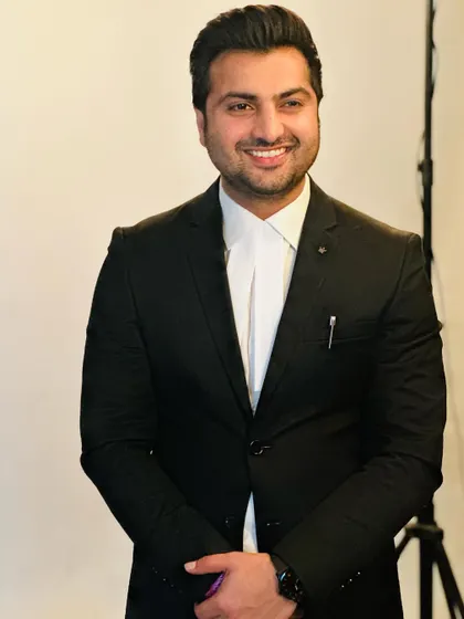 A professional photo where I believe a smile shows confidence and approachability.