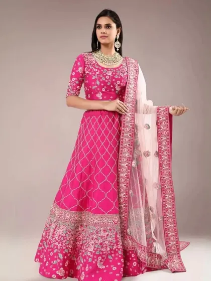 If you're looking for an outfit for a wedding or sangeet, we've got you covered. This vibrant pink lehenga is a beautiful and festive choice.