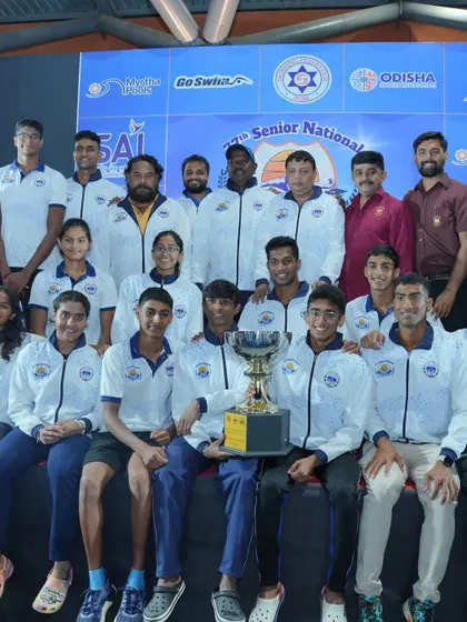 Another celebratory shot of the victorious team with their trophies.
