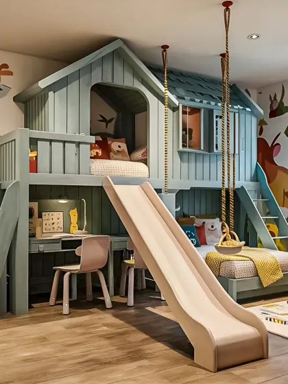 We love bringing imagination to life with our kids' room theme decor. This custom-built treehouse bunk bed includes a slide, a study nook underneath, and playful wall decals, creating a fun and functional space for children.