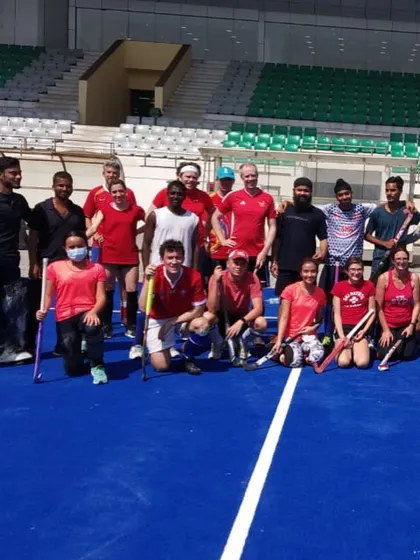 Another shot of the diverse group after our match with embassy officials. It's a great experience for my players to interact with people from different cultures.