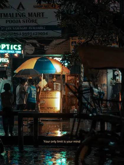 Another view of the momo stall, framed by the silhouette of a rickshaw. I often use framing to add depth and context to my street photography.