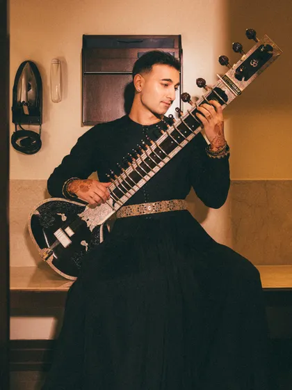 A clean, stylish shot with my sitar, perfect for fashion editorials or brand lookbooks.