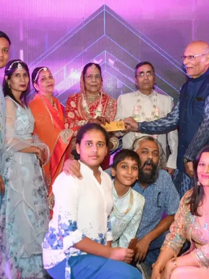 Another large family group photo, capturing the generations celebrating together.