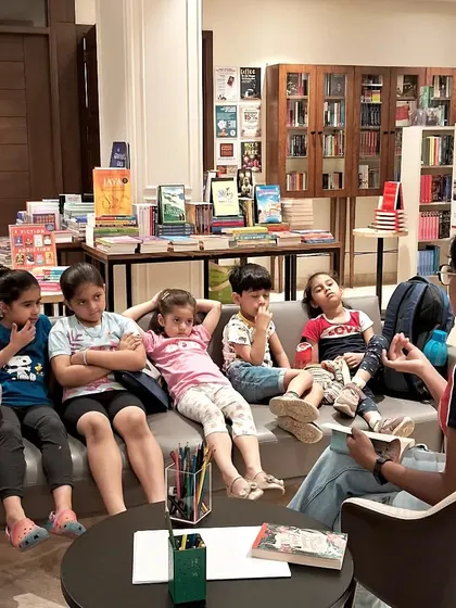 Deep in thought during a captivating tale. Our story sessions create a space where kids can listen, ponder, and get completely lost in the world of the book.