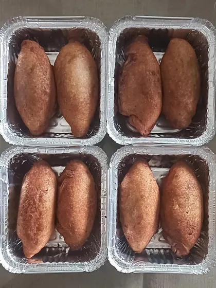 Freshly made bread rolls, perfect for breakfast or as a tea-time snack. They are crispy on the outside and soft on the inside.