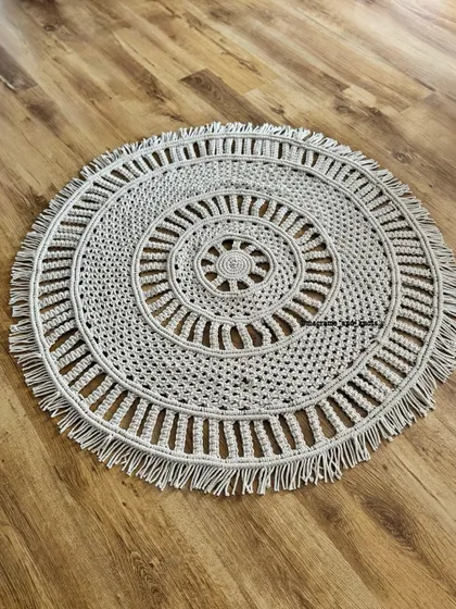 The full view of the large macrame rug, a piece that took a lot of time and effort but was completely worth it.