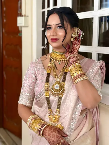 A close-up of the bride, her makeup looking flawless even at the end of a long day.