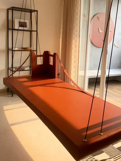 The Golden Gate swing seen from a different angle, highlighting its sleek form and the way it catches the afternoon light.