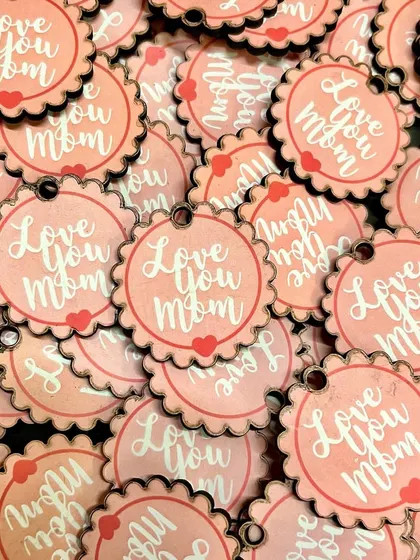 Little wooden scallops of love that went out with many Mother's Day gifts. A small detail to say 'Love You Mom'.