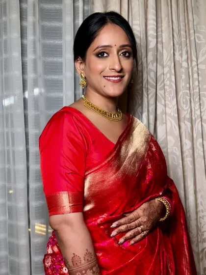 A simple, beautiful smile from a bride in her element. The makeup is designed to be comfortable and long-lasting for post-wedding celebrations.
