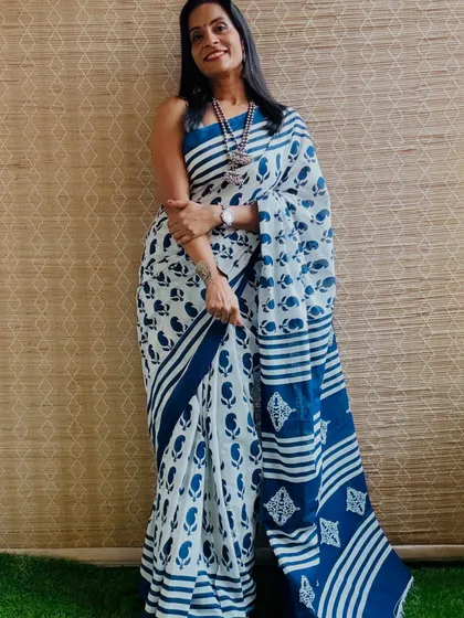 An indigo blue block printed cotton mulmul saree. This is a timeless print that always looks elegant and is perfect for both work and casual wear.