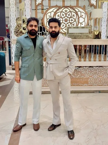 Here’s a look at two distinct styles for a modern celebration. On the left, a custom-tailored safari-style jacket, and on the right, a contemporary belted Jodhpuri suit, both designed for a sharp, confident look.